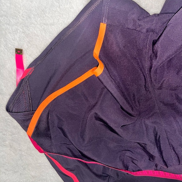 Under Armour Women's Purple Running Shorts with Neon Orange and Pink Accents - Picture 9 of 12